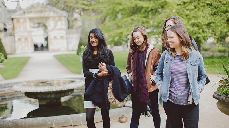 Students walking in Oxford Botanic Gardens